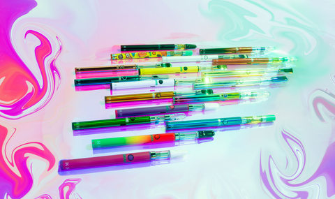 All the Ooze Twist Slim Pen 2.0 colors are laying flat in a group