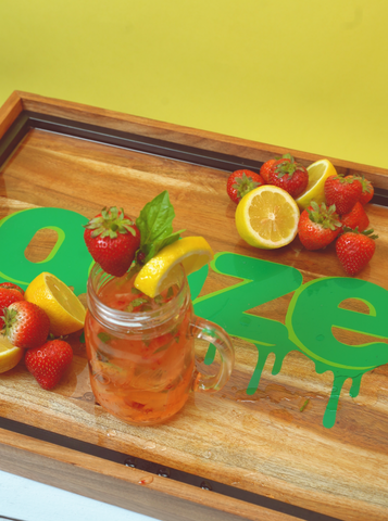 Strawberry Lemonade on Ooze wooden tray with yellow background