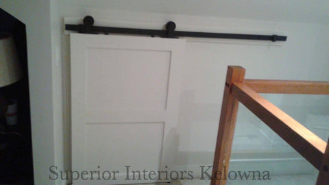 Custom built solid wood interior barn style doors by Superior Interiors Kelowna