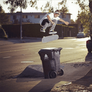 Elliot Murphy switch flip over a garbage can.