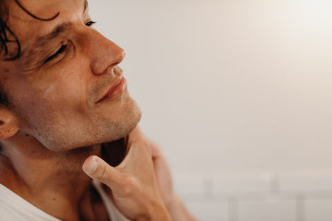 Image of man admiring his shaving