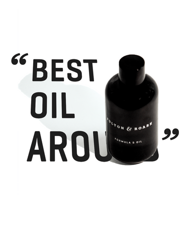 picture of body oil and hair oil bottle with text "best oil around"