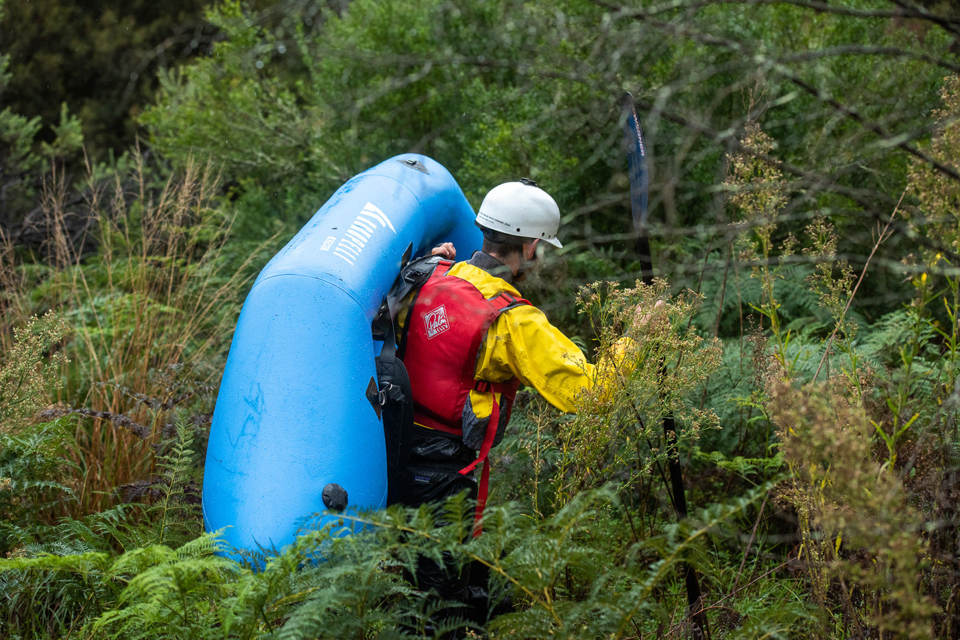 Carrying the Kokopelli Recon Self-Bailing Packraft 