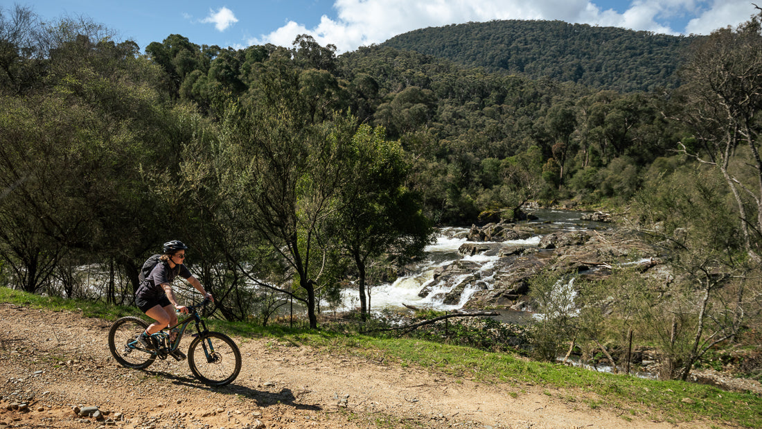 Chloe riding past the many rapids of the Goobarragandra river.