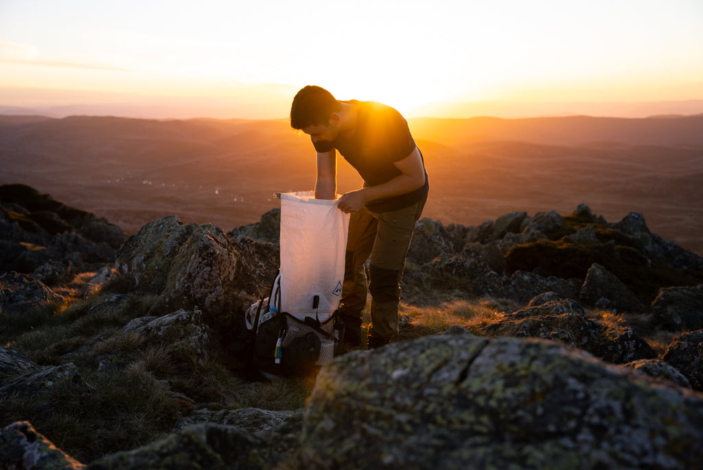 Hyperlite Mountain Gear 3400 Junction Pack on top of Mount Jagungal