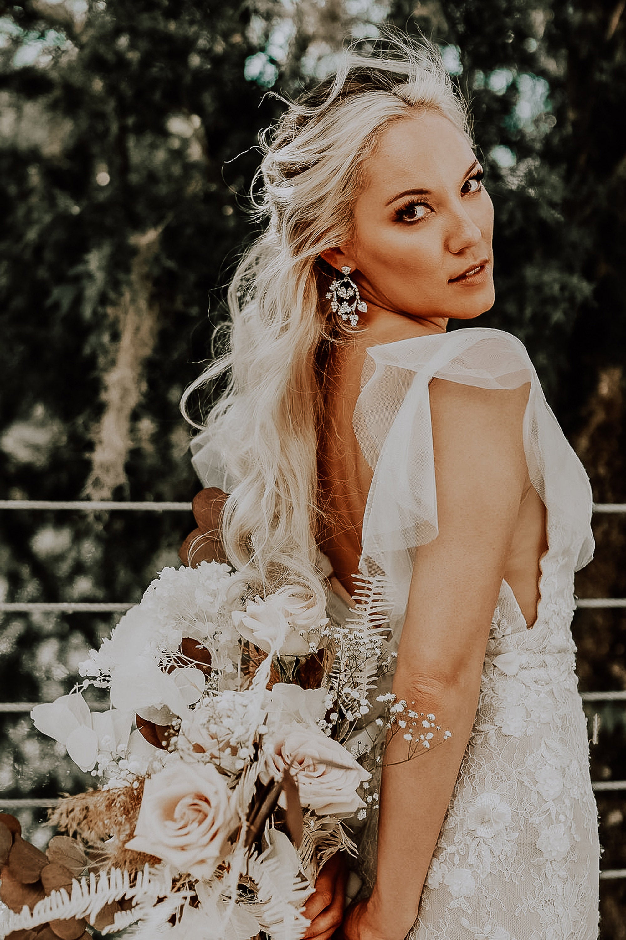 Destination Wedding Florida White Rock Canyon Boho Bride with Orchids and Dried Palm Leaves Bridal Bouquet