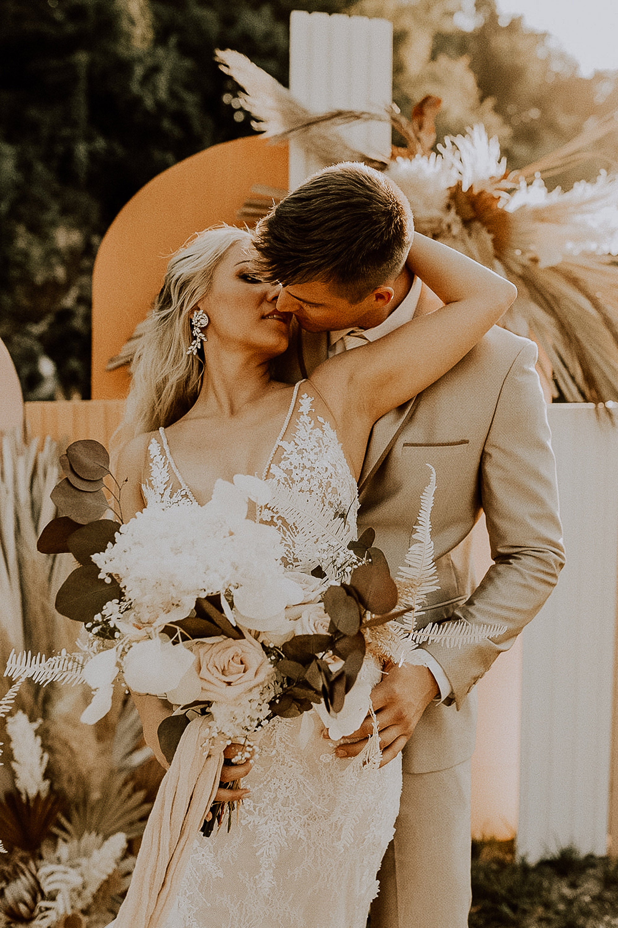 Boho Wedding with Orchids and Dried Palm Leaves Arch Back Drop White Rock Canyon Destination Florida