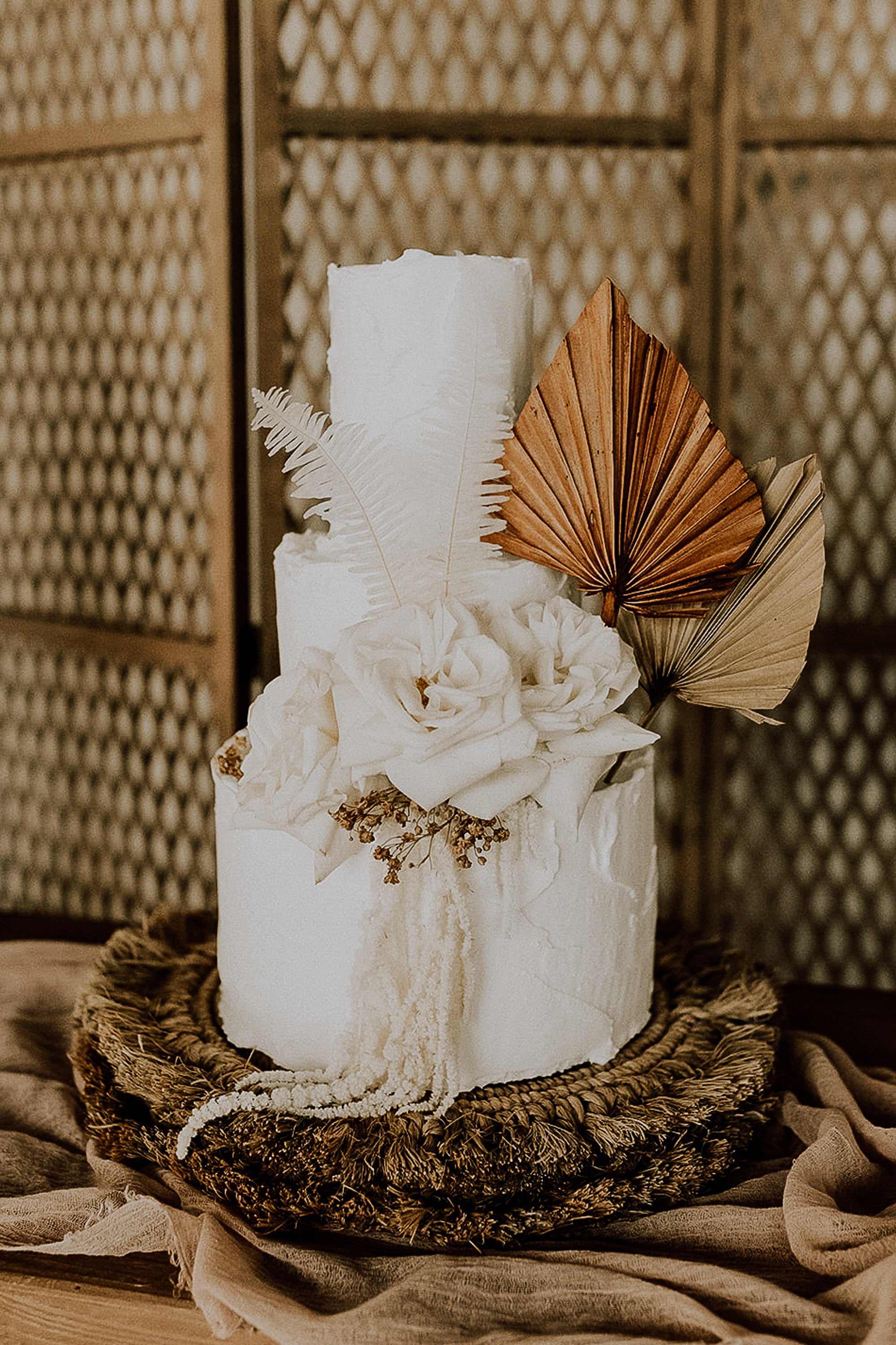 Destination Wedding Florida White Rock Canyon Boho Cake with Orchids and Dried Palm Leaves