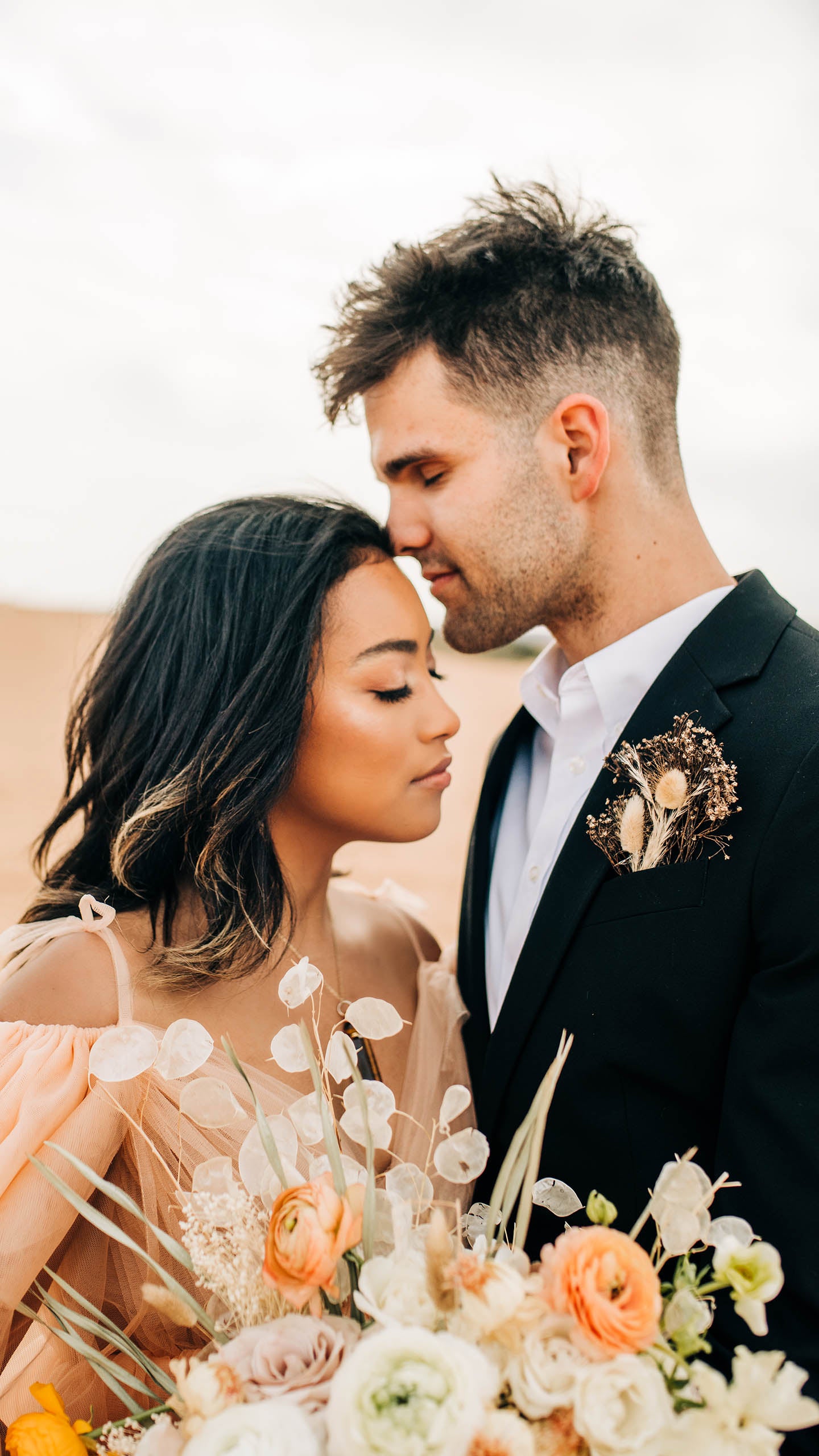 Desert Boho Bride and Groom with Flowers