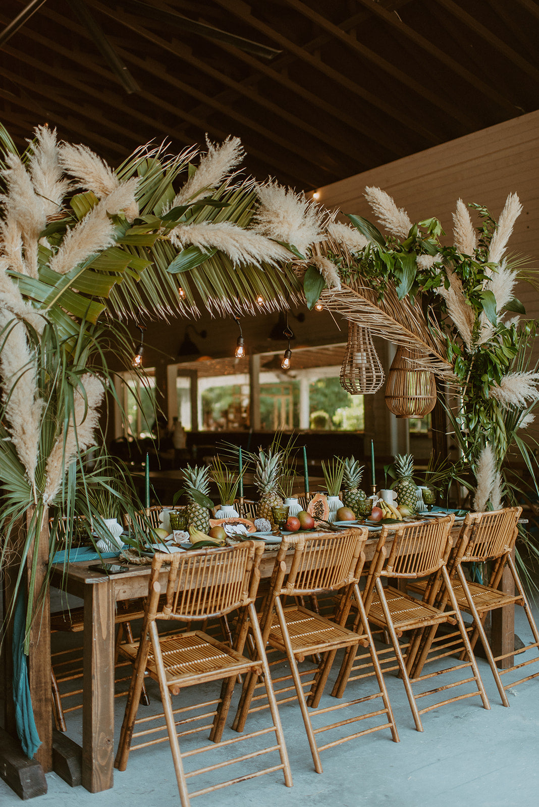 Neutral Tropical Boho Head Table with Dried Palm Leaves and Pampas Grass