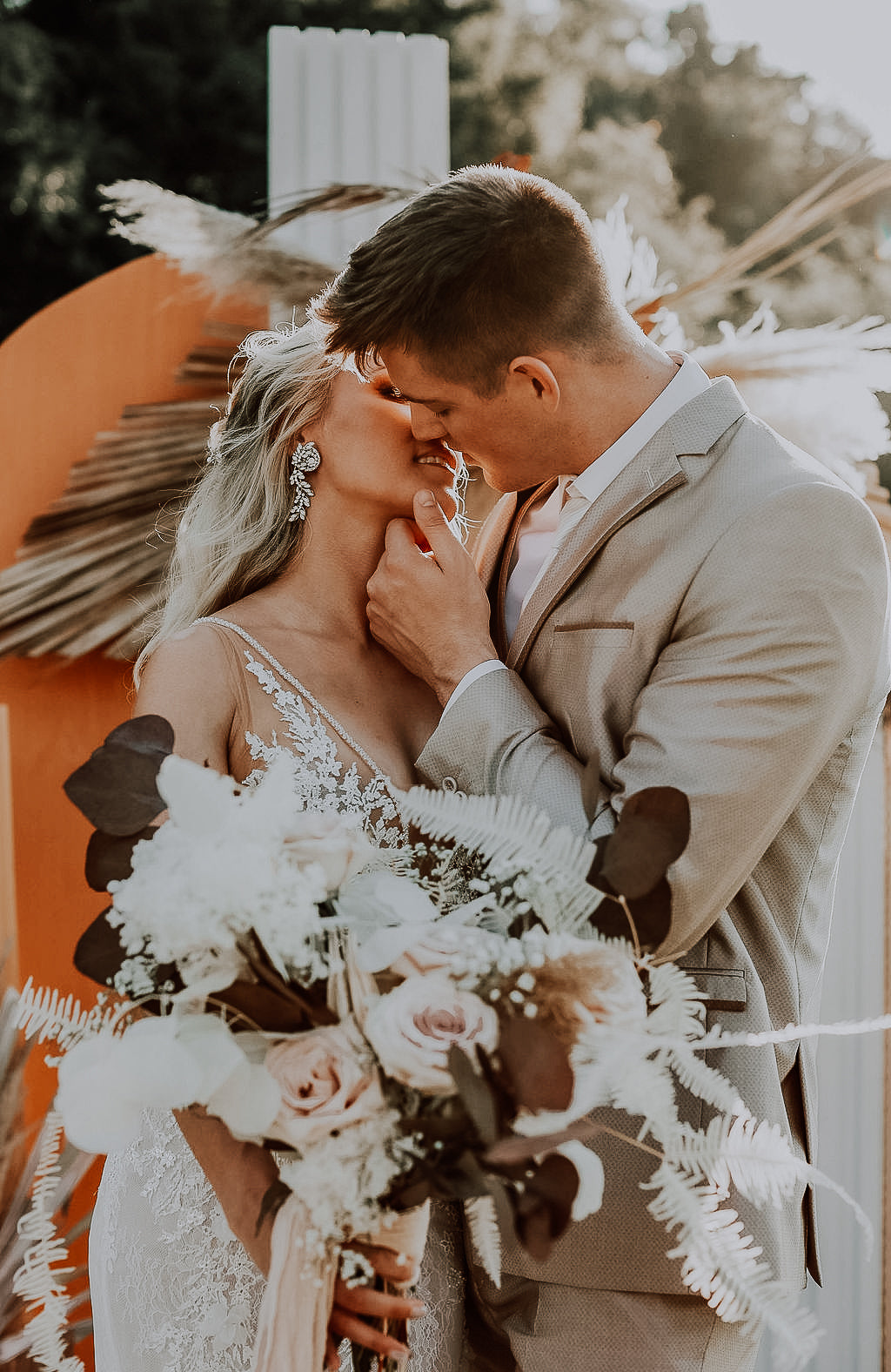 Boho Wedding with Orchids and Dried Palm Leaves Arch Back Drop White Rock Canyon Destination Florida