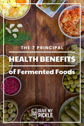 Variety of Fermented Foods on table with headline overlay_7 principal health benefits of fermented foods