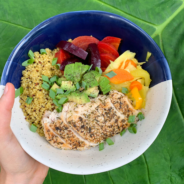 grain bowl with roasted beets, chicken and fermented vegetables