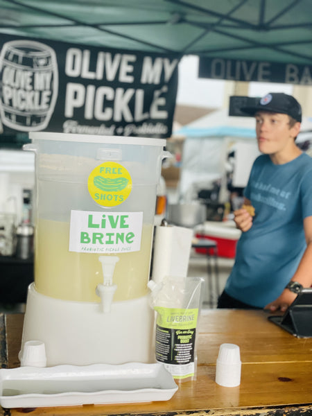 LiveBrine Pickle Juice Taste Station at farmers market