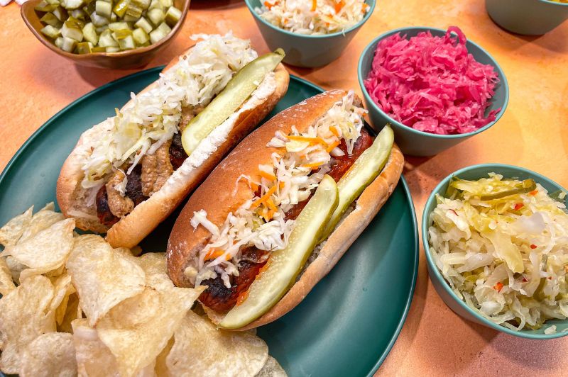 hot dogs in buns with sauerkraut