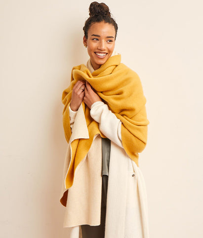 SENREVE model wrapped in cashmere blanket