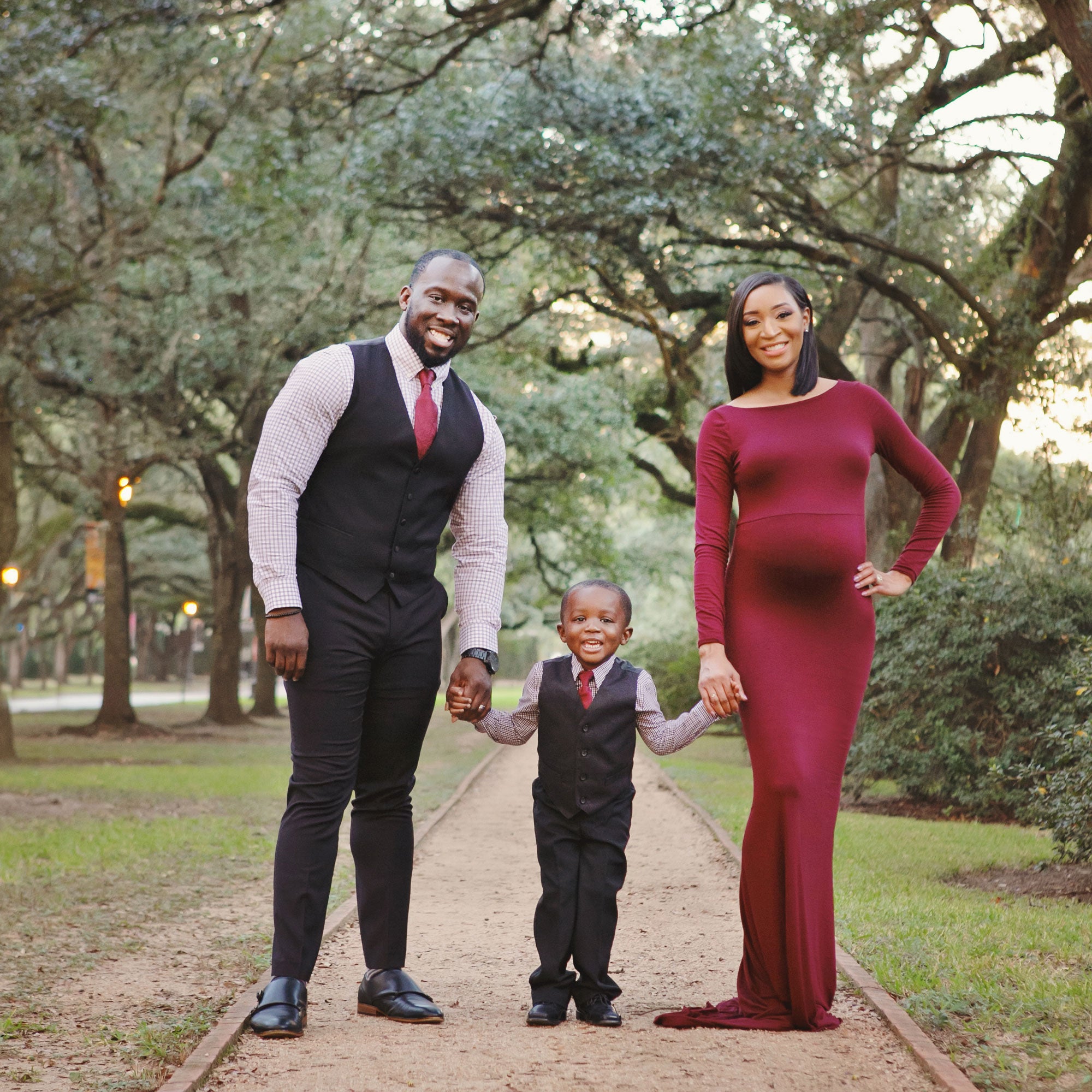 Brittany, son, and husband in a park