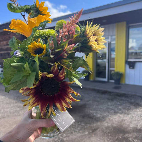 Delivering a fresh bouquet to a consignment location