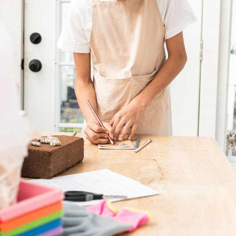 young man creating models for a mushroom growing activity