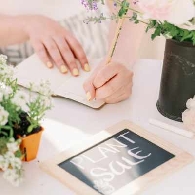 girl planning a flower farm on paper