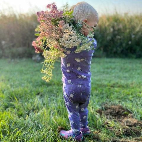 Young girl holding flower bouquet