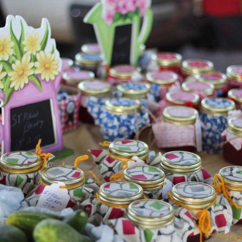 Jars of homemade jam representing value added products at the farmers market
