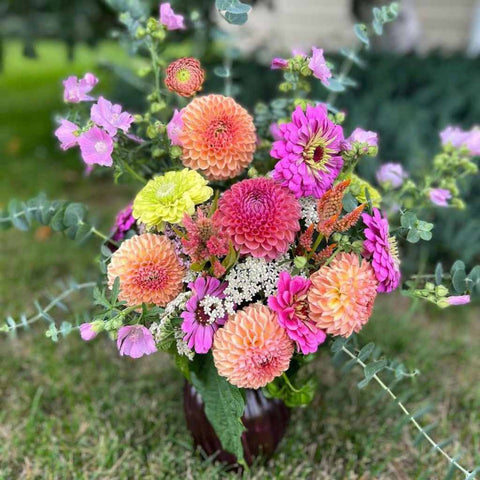 Pink Floral Arrangement in red vase