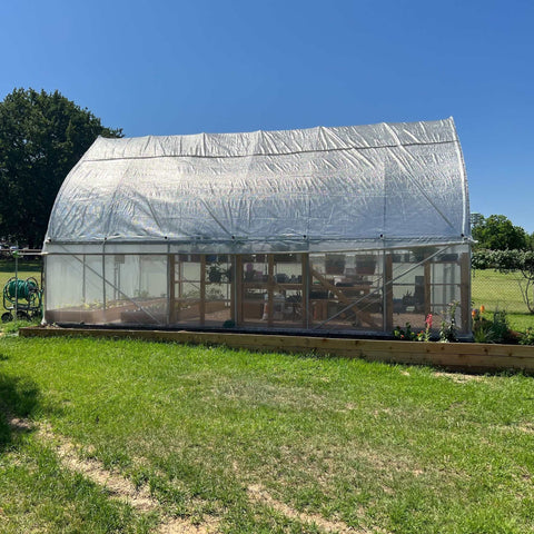 Aluminum shade cloth on gothic greenhouse