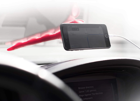 Tenikle car phone mount holding an iphone