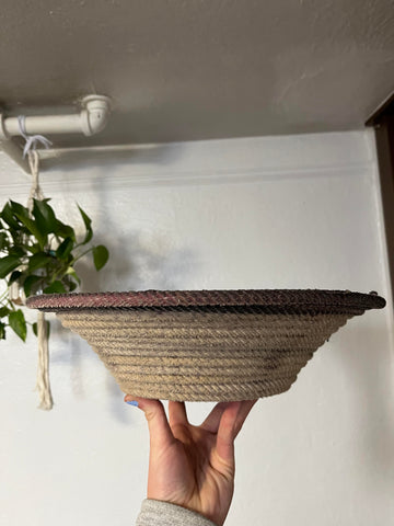 Patterned basket from repurposed cowboy ranch rope, cleaned and is not a beautiful conversation piece, fruit or flower bowl.