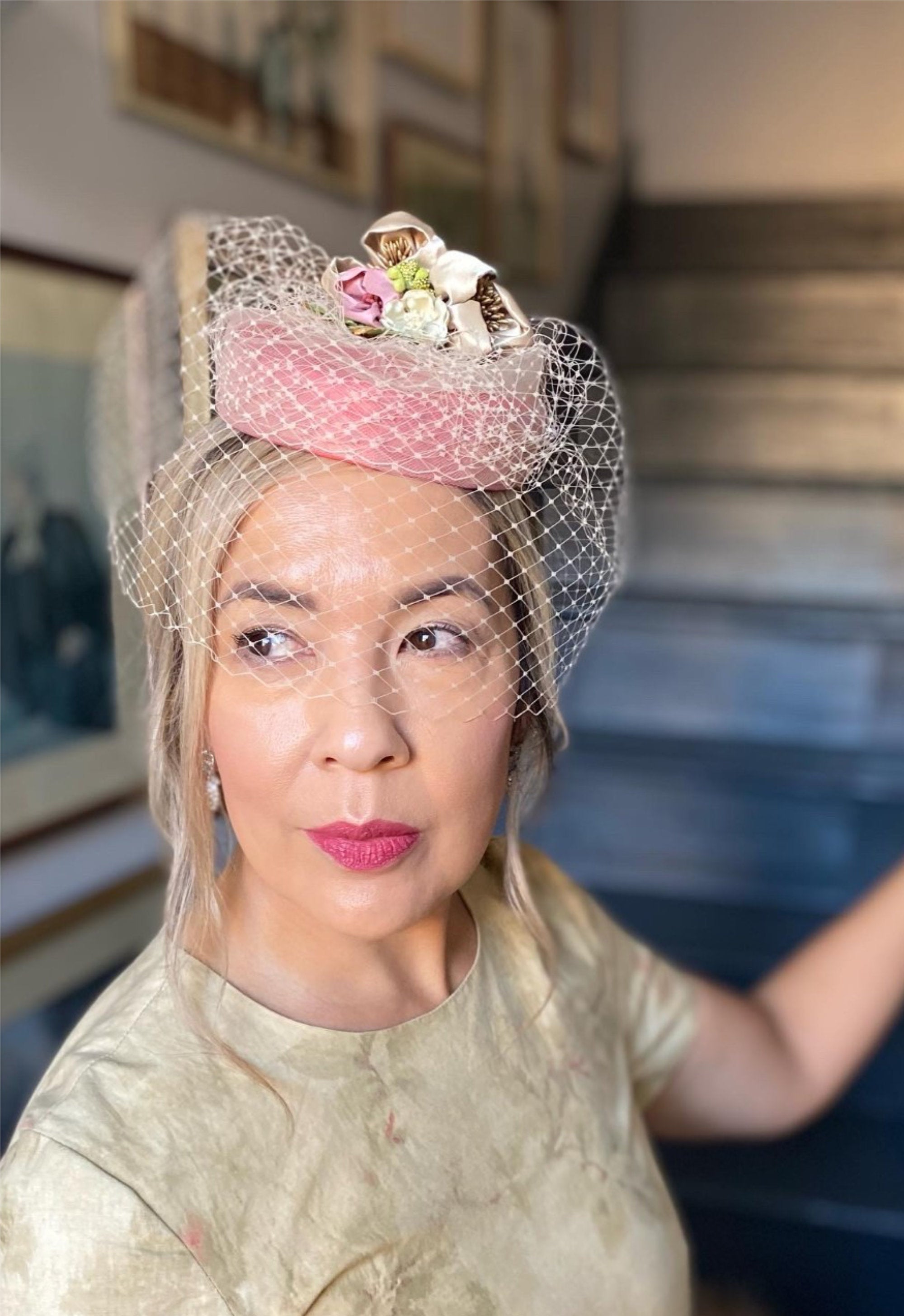 Lisa wearing her custom-made Flower Coquette with birdcage veil