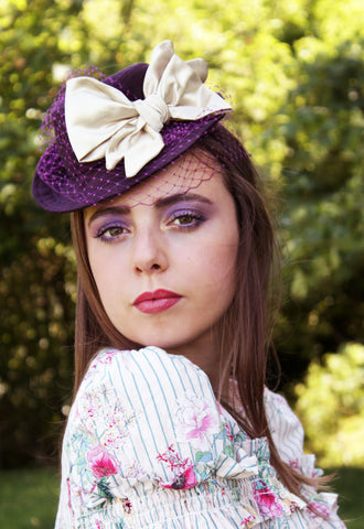 Purple Tilt Hat with Champagne Bow