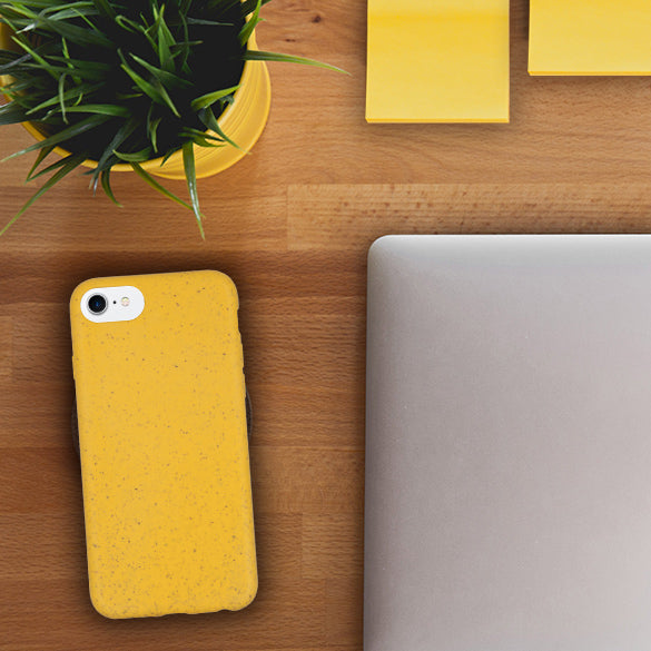Office Flatlay with COmpostbale Yellow Phone Case