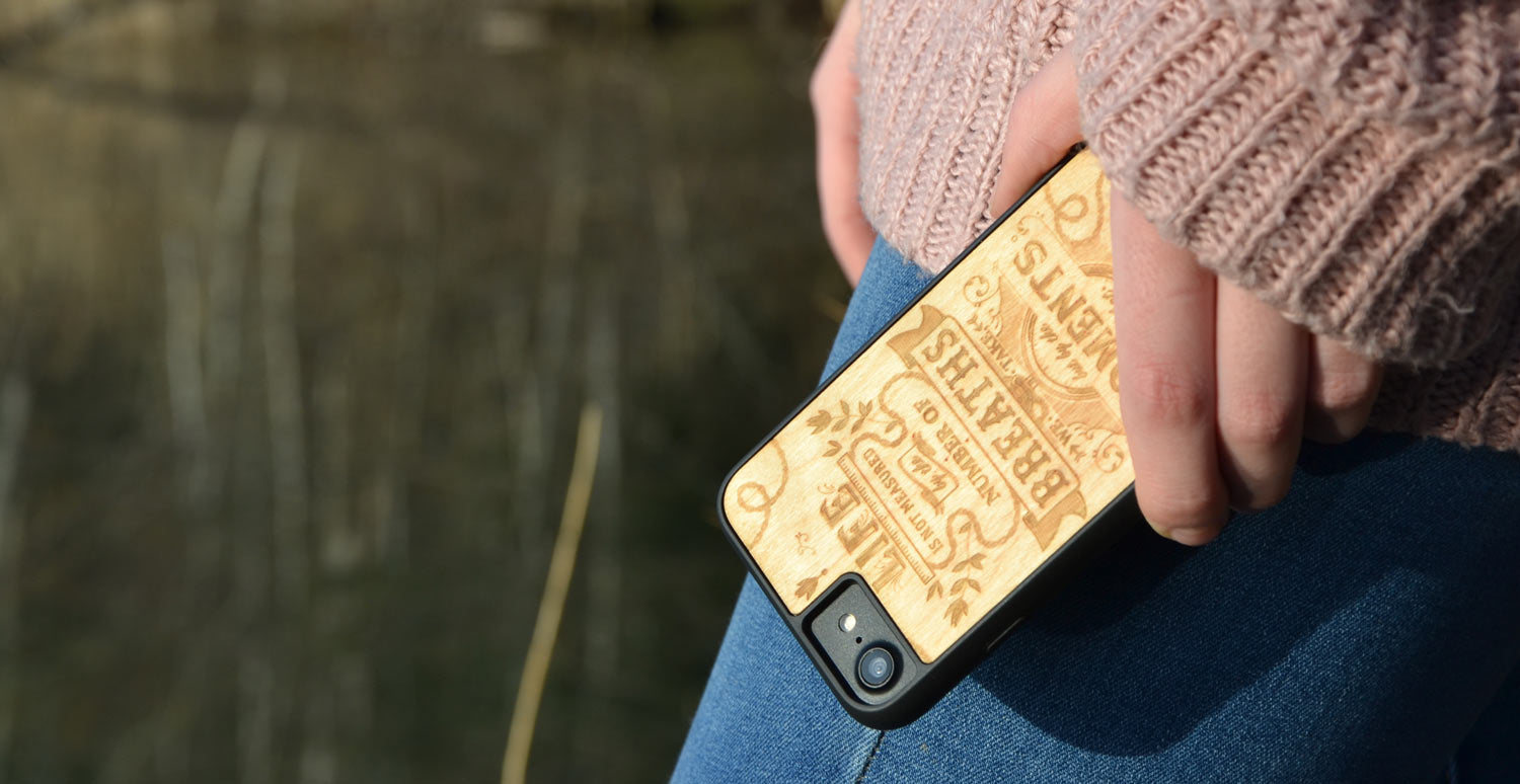 The Meaning Phone Case held in hand