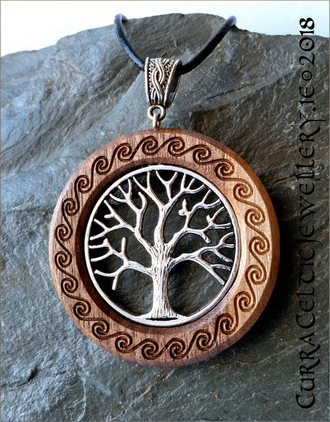 Tree of Life in silver or bronze finish on Iroko with carved Celtic spirals and matching bail.