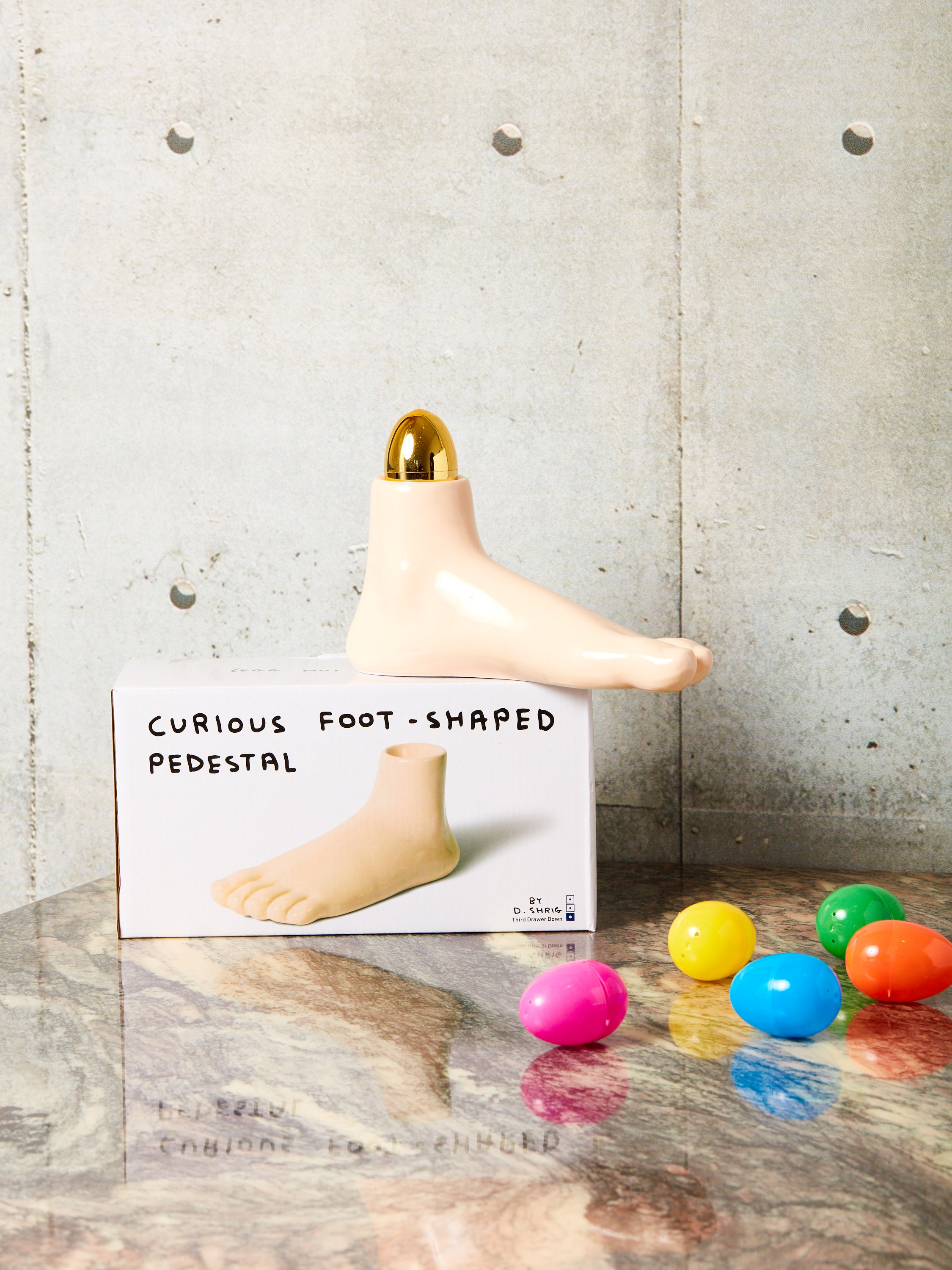 Curious Foot-Shaped Pedestal by David Shrigley