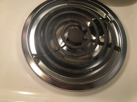 Image of electric coil element with new chrome drip bowl beneath it