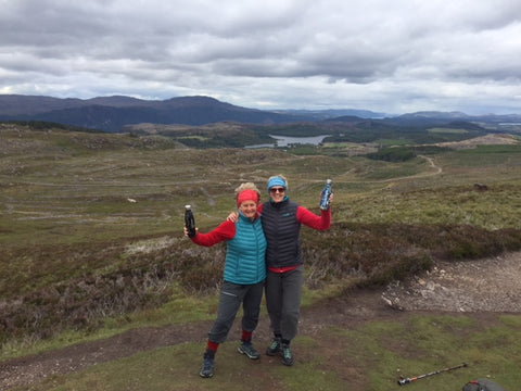 Wild Kiwi clothing New Zealand, women wearing down vests and holding our re-usable drink bottles