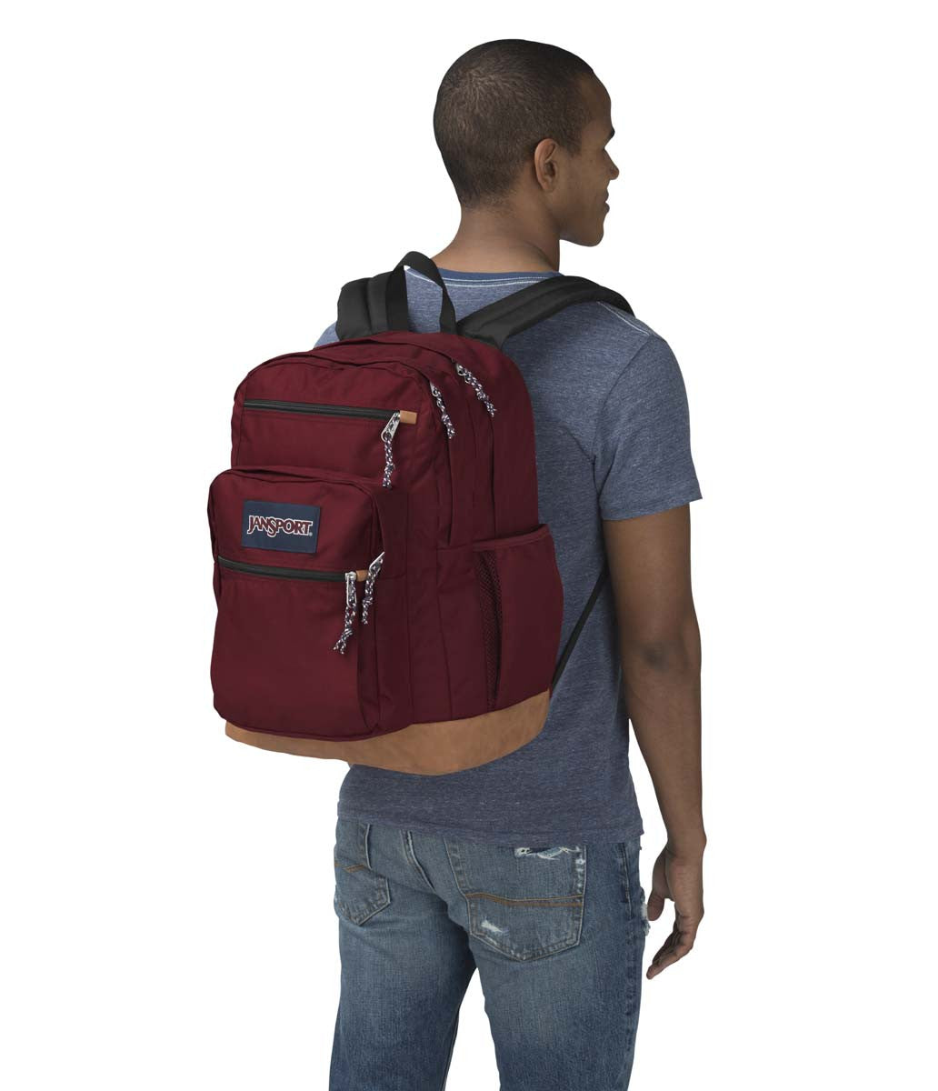 red jansport big student backpack