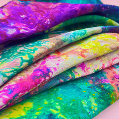 An up close shot of tie dye sari fabric sheets