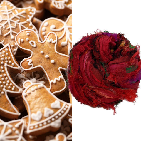 On the left, a pile of iced gingerbread cookies, with a nest of red windswept ribbon yarn on the right.