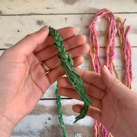 Sari ribbon braided and tied at the end