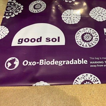 A close up of a DGY polymailer. It says 'Oxo-Biodegradeable'