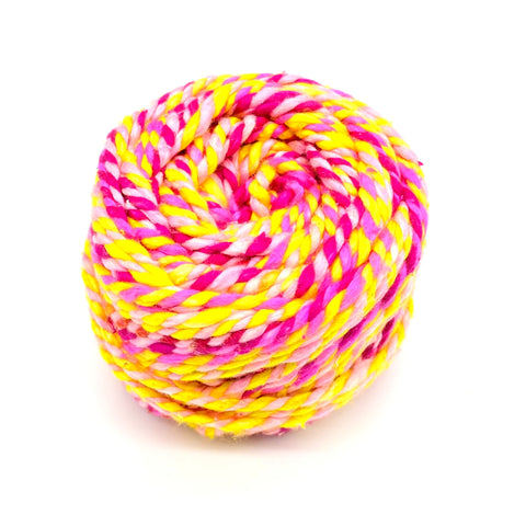 Darn Good Twist Worsted Weight Silk Yarn-Pink Lemonade. This yarn is a gorgeous twist of pink, pastel pink, pastel yellow, and neon yellow.