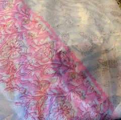 The same ivory and pink skirt, but where that black stain was, there is now a damp spot from where the cleaner was added. The black spot is gone! 