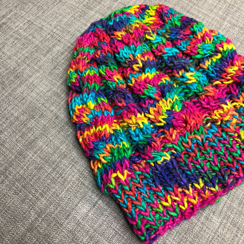 Magnolia Knit Beanie made with multicolor rainbow Silk Roving Worsted Weight Yarn