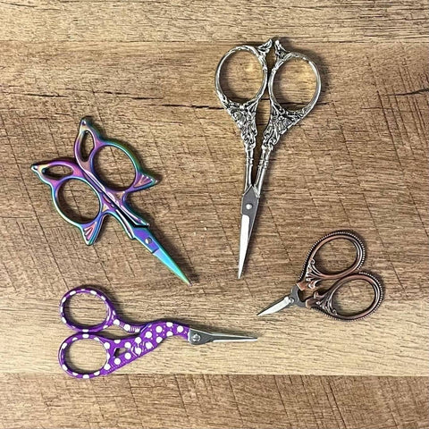 Whimsical assorted craft scissors for fiber artists and cosplayers.