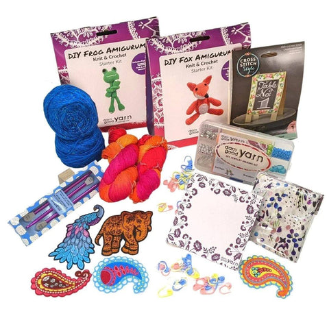 Crafting supplies bundle with jewelry making kit, iron on patches, yarn, amigurumis, and more! High end stocking stuffers for crafty people.