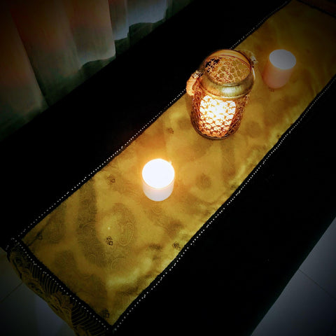 Finished Sari Silk Table Runner with Candles on Wooden Table