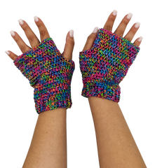 A pair of hands, wearing fingerless mitts made out of multicolored rainbow silk yarn.
